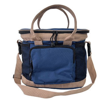 Front zipper pocket of the AJT Premium Grooming Bag in Navy Blue with Tan accents