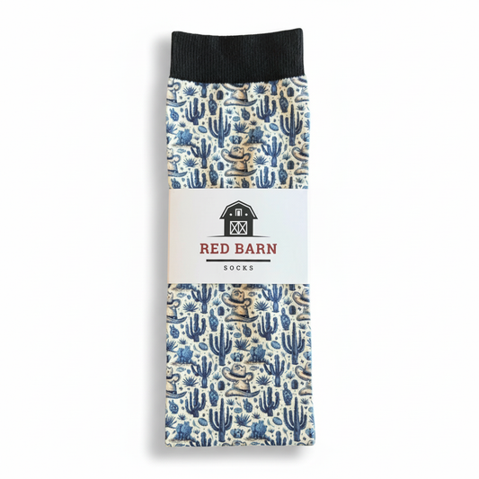 Socks with cactus pattern packaging featuring Red Barn branding on a white background