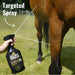 Horse owner spraying the UltraShield® EX Insecticide & Repellent to show the wide targeted spray area.
